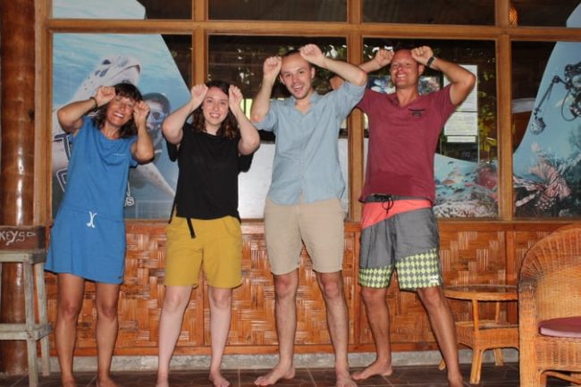 Divers making hammerhead sign Hammerhead Shark Encounter for First Time Divers